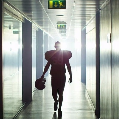 A picture of Garry Chapman wearing the football gear.